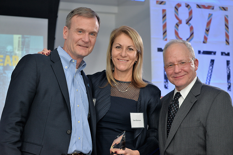 Carol Bramson (BUS '89), investor and CEO; founder, TBG Capital; won the Distinguished Entrepreneur of the Year award. From lef to right: Barmson; Bruce Leech, executive director of the Coleman Center; and Michael W. Hennessy, president and CEO of the Coleman Foundation. 
